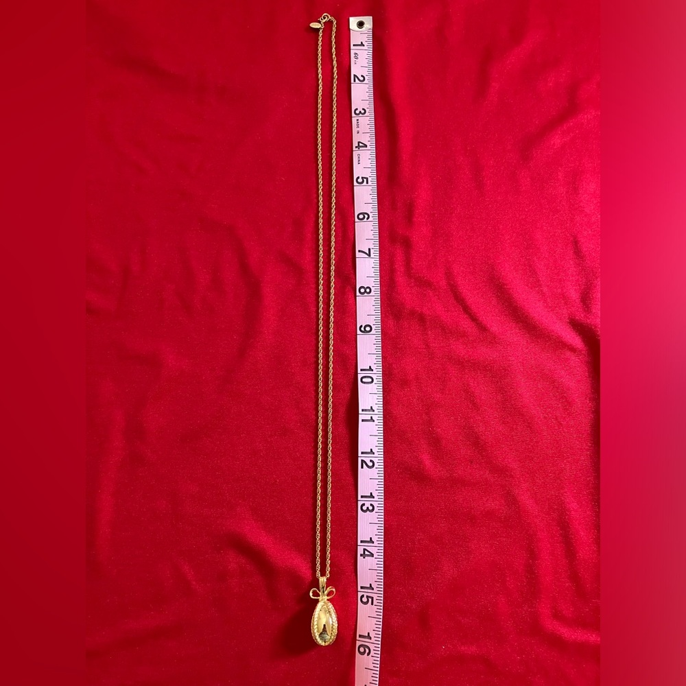 Joan Rivers gold tone egg necklace
